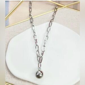Stainless Steel  17” Necklace. With a ball pendant.